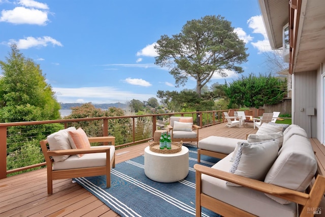 wooden deck featuring an outdoor living space