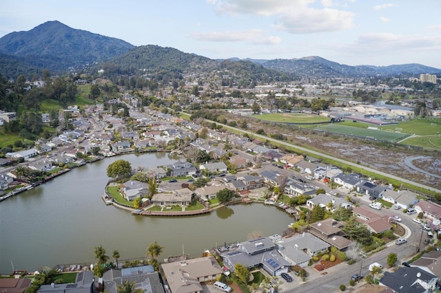 aerial view with a residential view and a water and mountain view