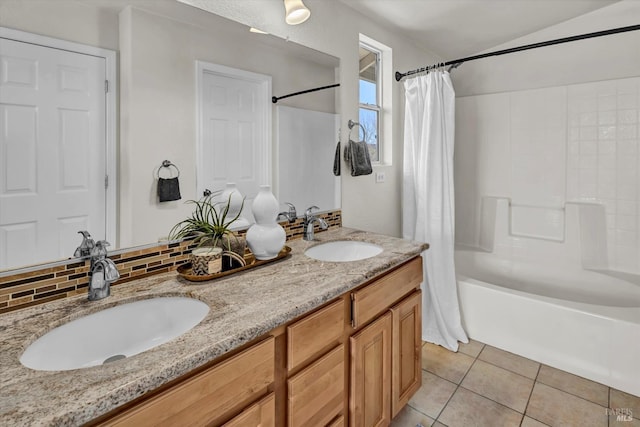 full bath with shower / tub combo with curtain, double vanity, a sink, and tile patterned floors