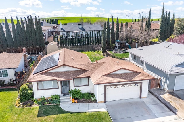 birds eye view of property with a residential view