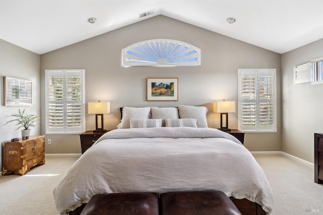 carpeted bedroom with baseboards, visible vents, and lofted ceiling