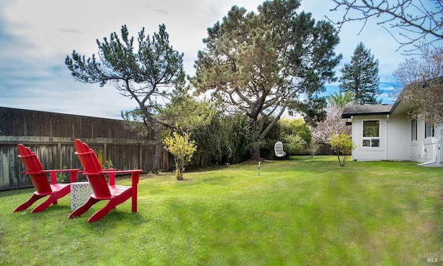 view of yard with a fenced backyard