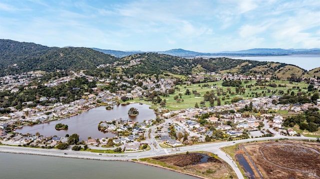 aerial view featuring a water and mountain view