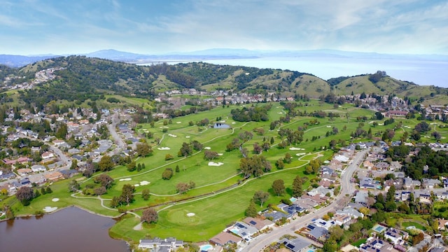 bird's eye view featuring a residential view, golf course view, and a water and mountain view