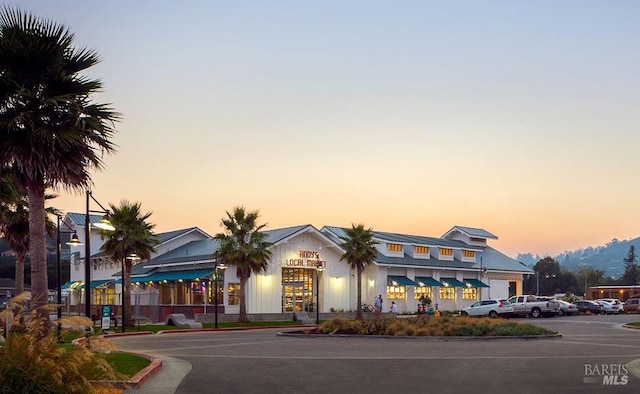 view of property at dusk