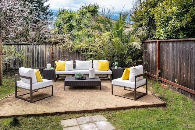 view of patio / terrace featuring outdoor lounge area and a fenced backyard