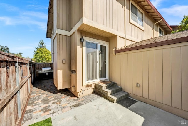 exterior space with a patio area and fence