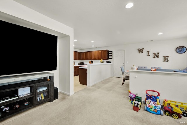 playroom featuring recessed lighting and light colored carpet