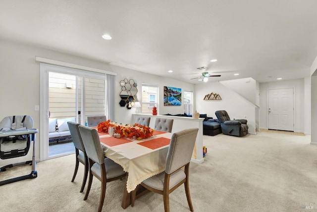 dining area featuring baseboards, recessed lighting, a ceiling fan, and light colored carpet