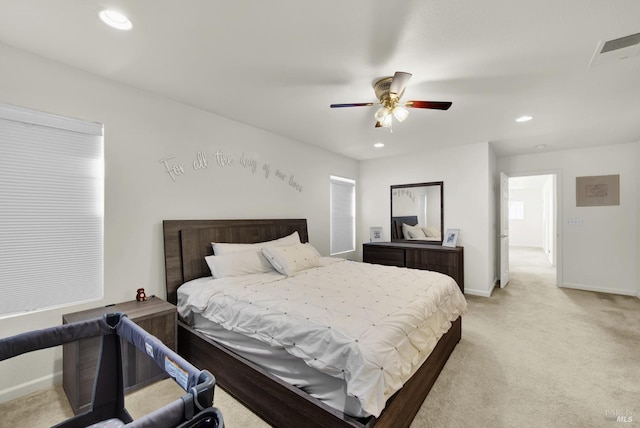 bedroom with recessed lighting, light colored carpet, visible vents, ceiling fan, and baseboards