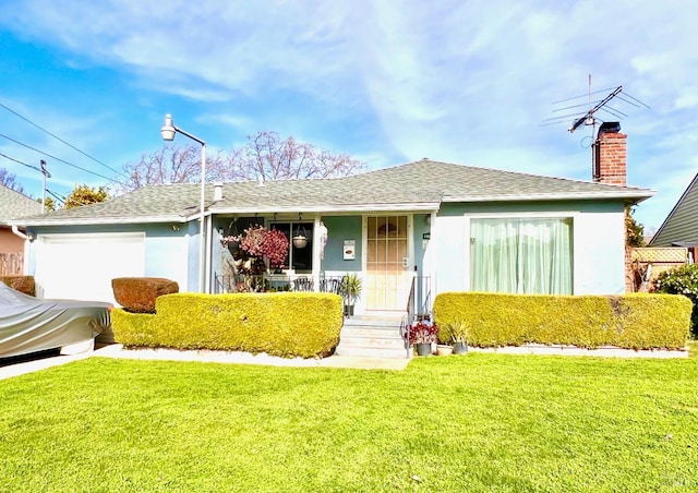 single story home with a garage, a porch, a front lawn, and stucco siding