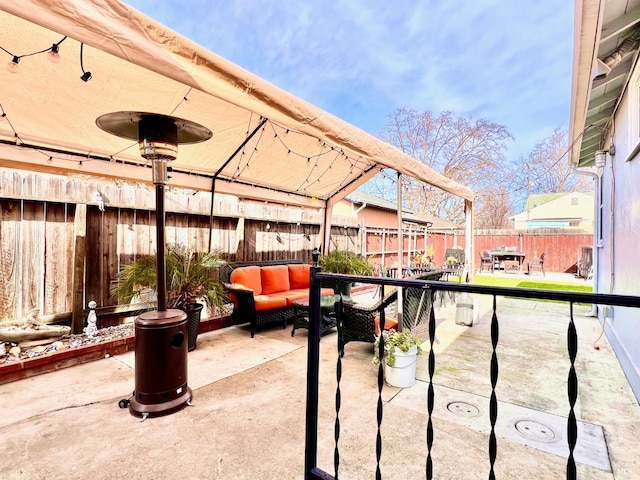 view of patio / terrace featuring a fenced backyard and outdoor lounge area