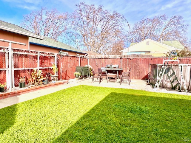 view of yard with a fenced backyard and a patio