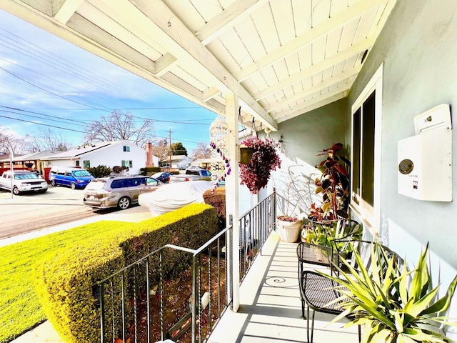 balcony featuring covered porch