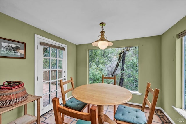 14031 Ettawa Springs Rd, Middletown, CA 95461 - dining area with a healthy amount of sunlight and baseboards