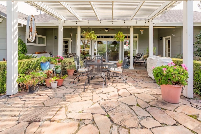view of patio with outdoor dining area and a pergola