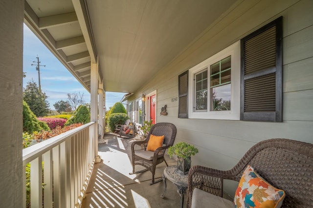 balcony featuring a porch