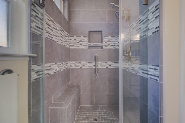 bathroom with a stall shower