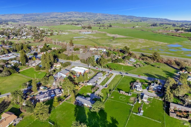 bird's eye view featuring a residential view and a water view