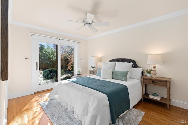 bedroom with access to outside, crown molding, and wood finished floors