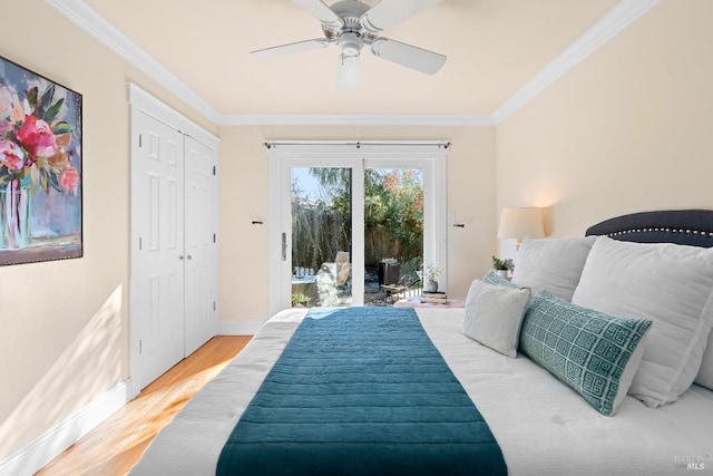 bedroom featuring baseboards, ceiling fan, ornamental molding, wood finished floors, and access to outside