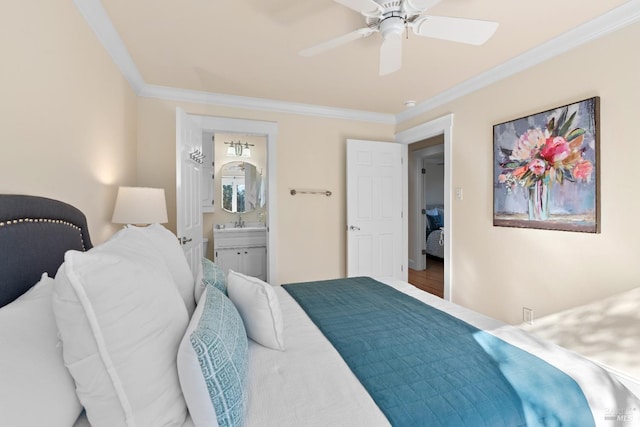 bedroom with a ceiling fan, wood finished floors, crown molding, and ensuite bathroom