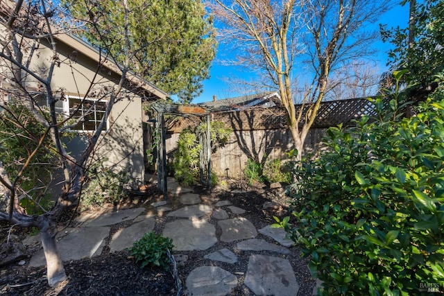 view of patio featuring fence