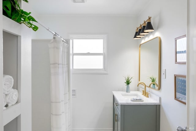 bathroom featuring a shower with curtain, visible vents, and vanity