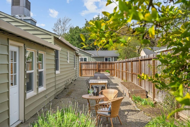 view of yard featuring a patio area and a fenced backyard