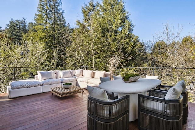 deck with an outdoor hangout area