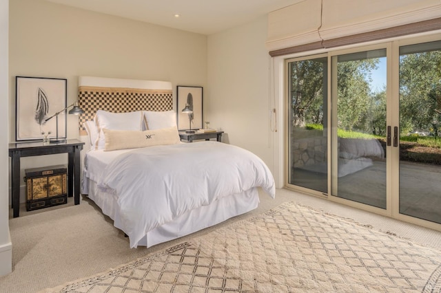 bedroom featuring access to exterior, recessed lighting, and carpet