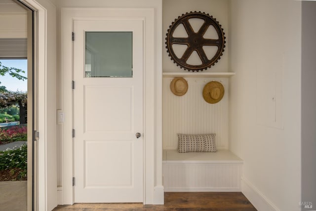 mudroom featuring dark wood finished floors