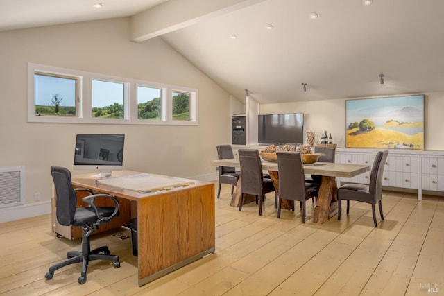home office with light wood finished floors, baseboards, vaulted ceiling with beams, and visible vents