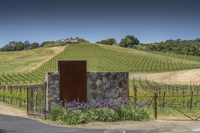 exterior space featuring a rural view and fence