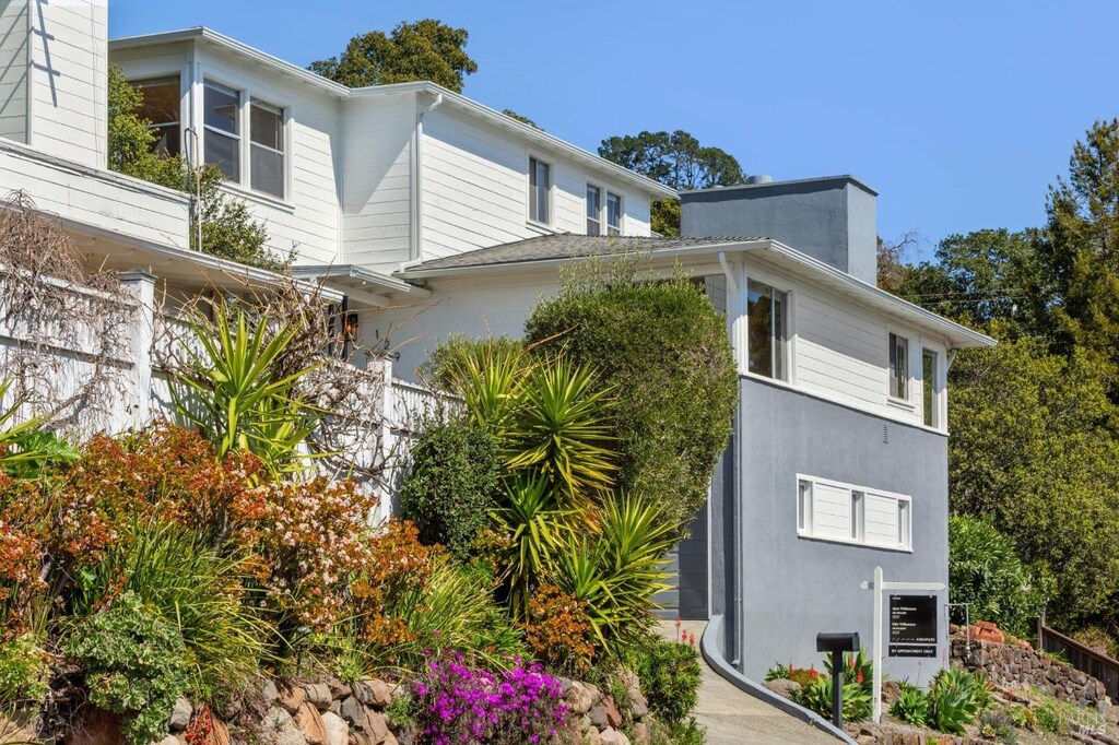 129 Bretano Way, Greenbrae, CA 94904 - view of home's exterior featuring a chimney