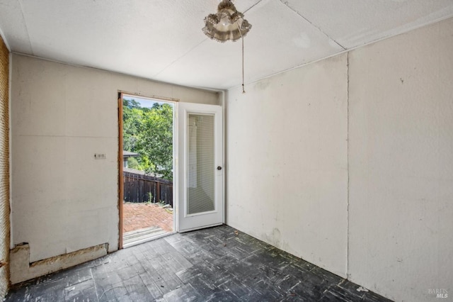 unfurnished room with tile patterned floors