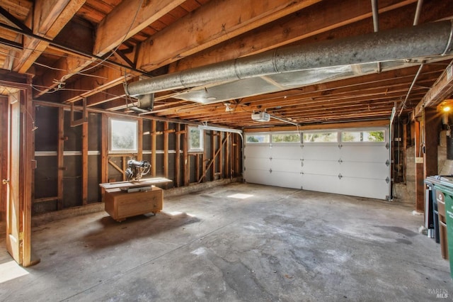 garage featuring a garage door opener