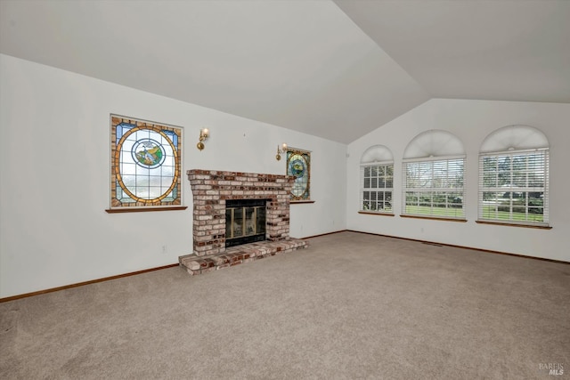 unfurnished living room featuring lofted ceiling, carpet floors, visible vents, baseboards, and a brick fireplace