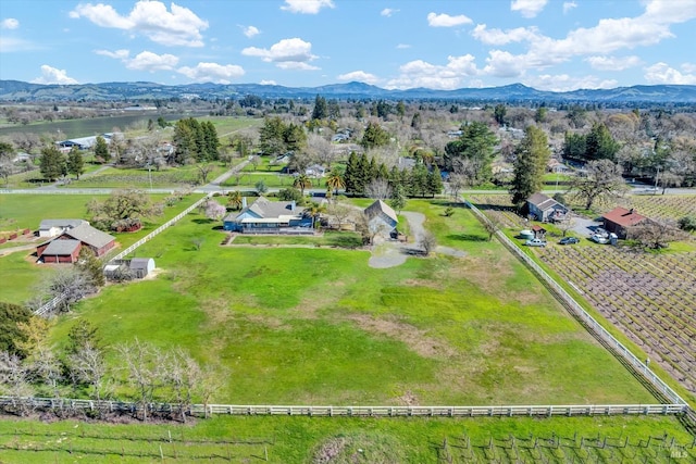 bird's eye view with a rural view and a mountain view