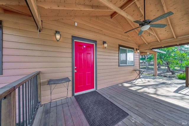 exterior space featuring a wooden deck and a ceiling fan