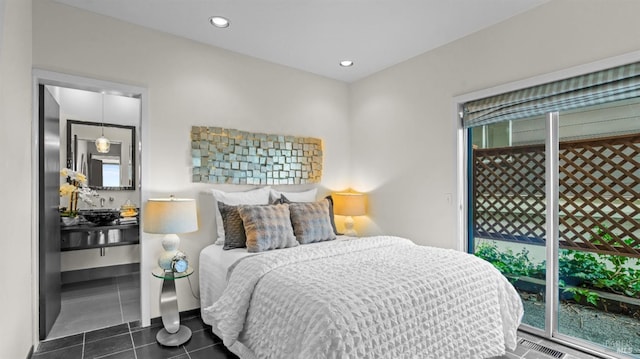 bedroom featuring recessed lighting, visible vents, and dark tile patterned floors