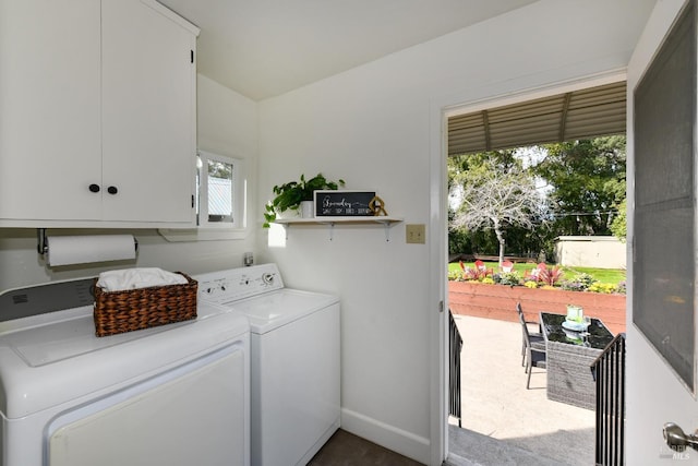 laundry room with carpet floors, cabinet space, baseboards, and independent washer and dryer