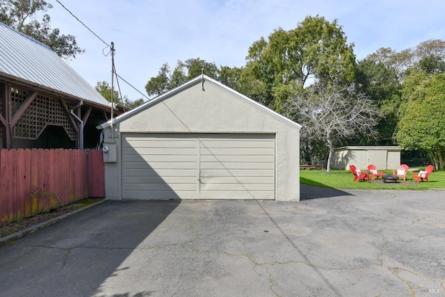 detached garage with fence