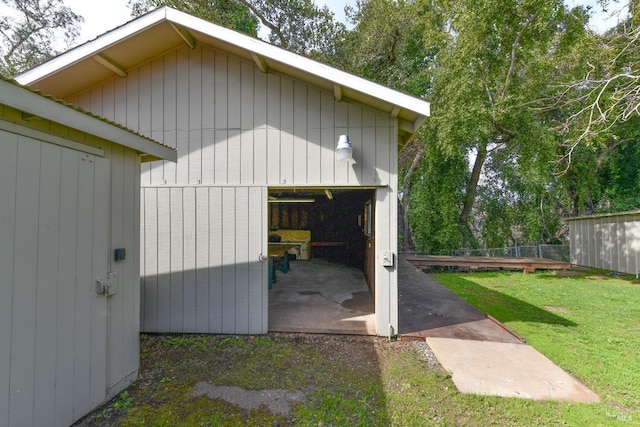 view of outdoor structure with fence