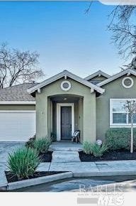 property entrance with an attached garage