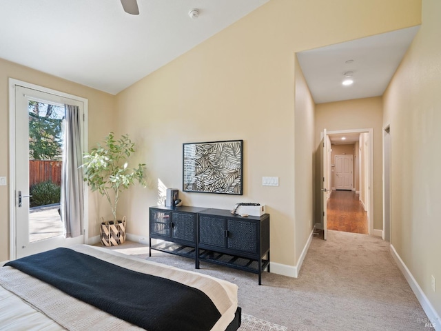 carpeted bedroom featuring access to outside, vaulted ceiling, baseboards, and ceiling fan