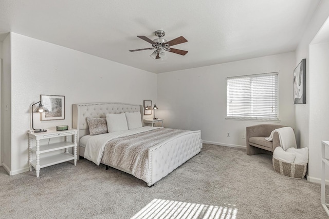 bedroom featuring baseboards, carpet, and a ceiling fan