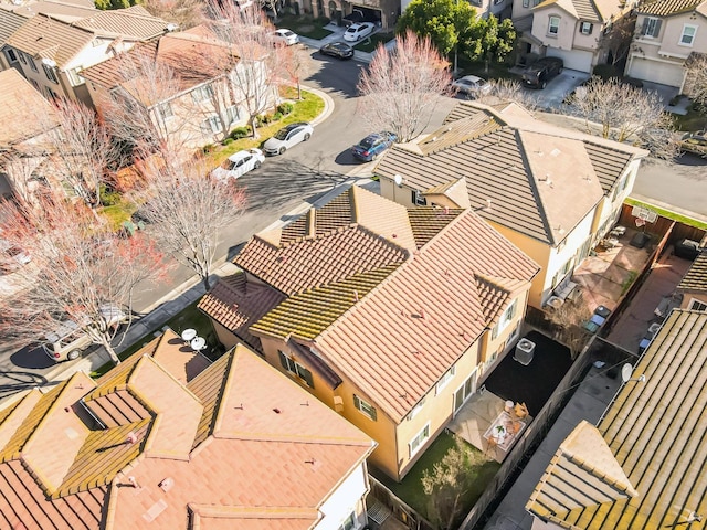 birds eye view of property with a residential view