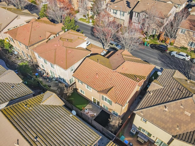 birds eye view of property with a residential view