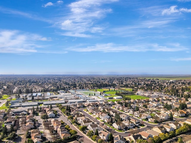 birds eye view of property with a residential view